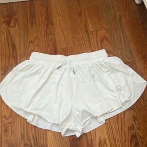 Butterfly flowy athletic shorts size large. White and only used once.